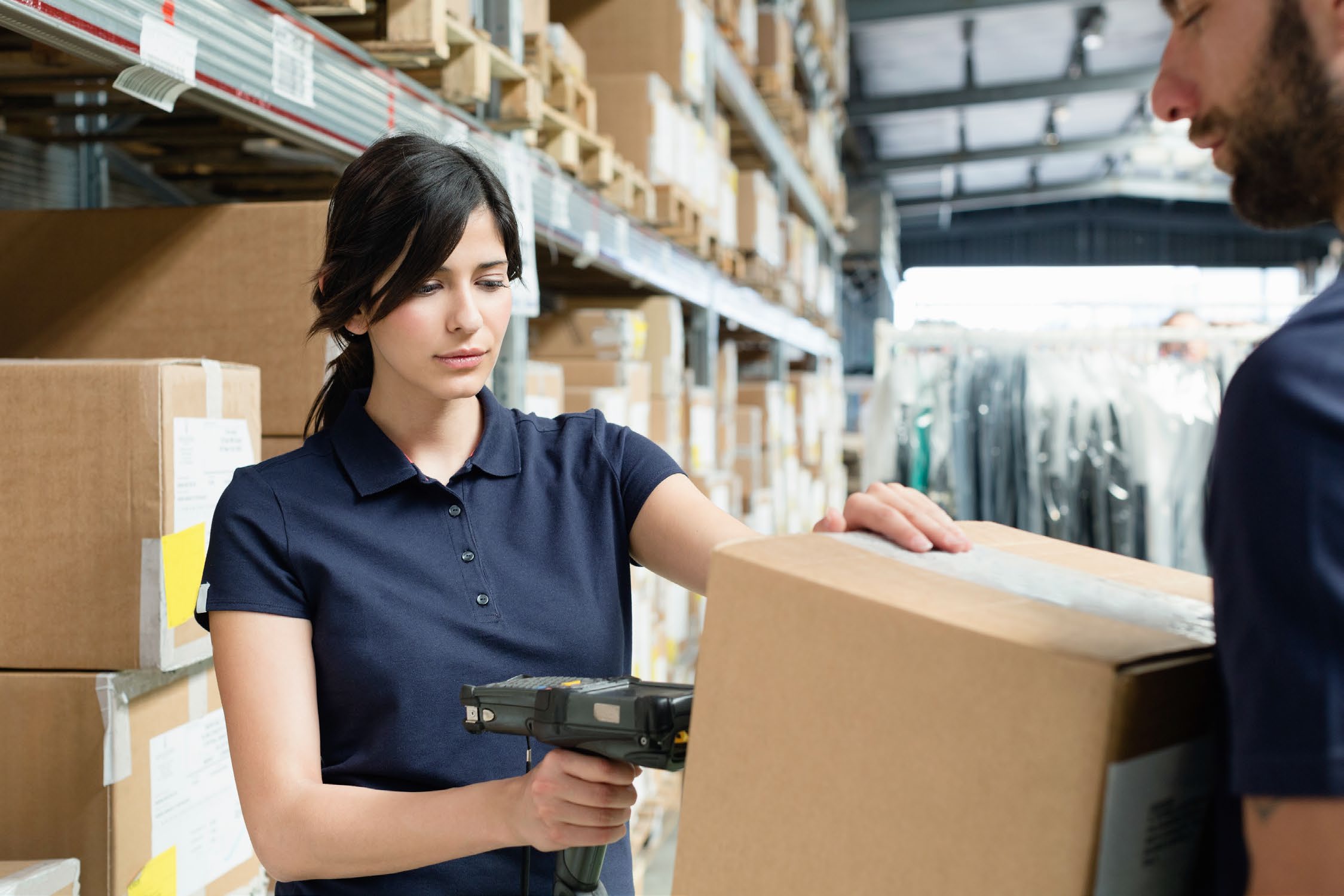 Warehouse worker scanning a return at receiving, Owen Allen Solutions